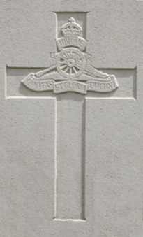 Cross shaped gravestone with Gunner emblem
